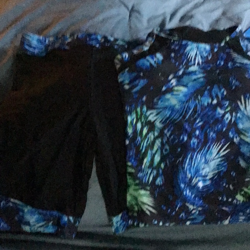 2-piece bathing suit. Knee length shorts.